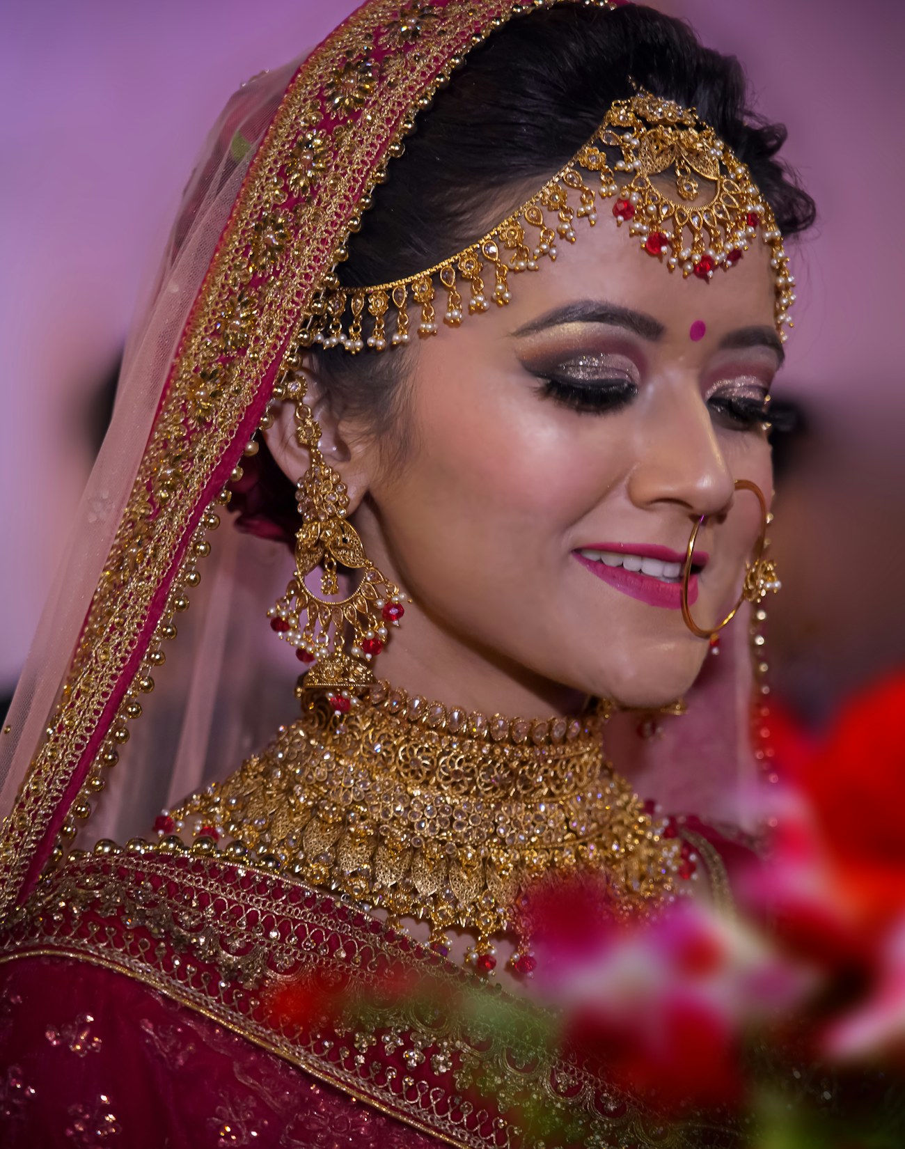 Bridal jewellery and makeup detail