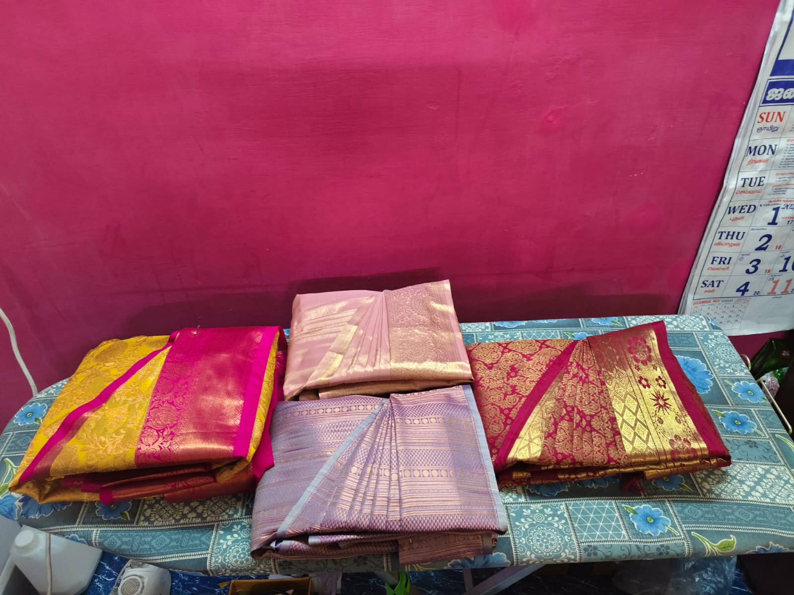 Silk sarees pressed and ready at Jack & Rose